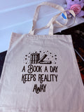 Bookish tote Bag - A Book a Day Keeps Reality away (Black)